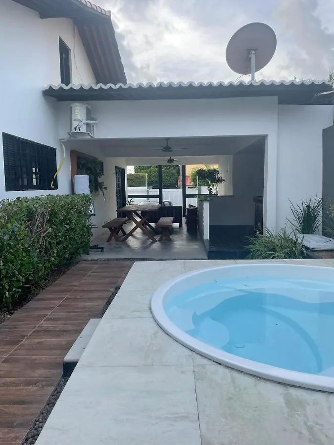 Linda casa com jacuzzi no coração de ponta negra Vila Natal